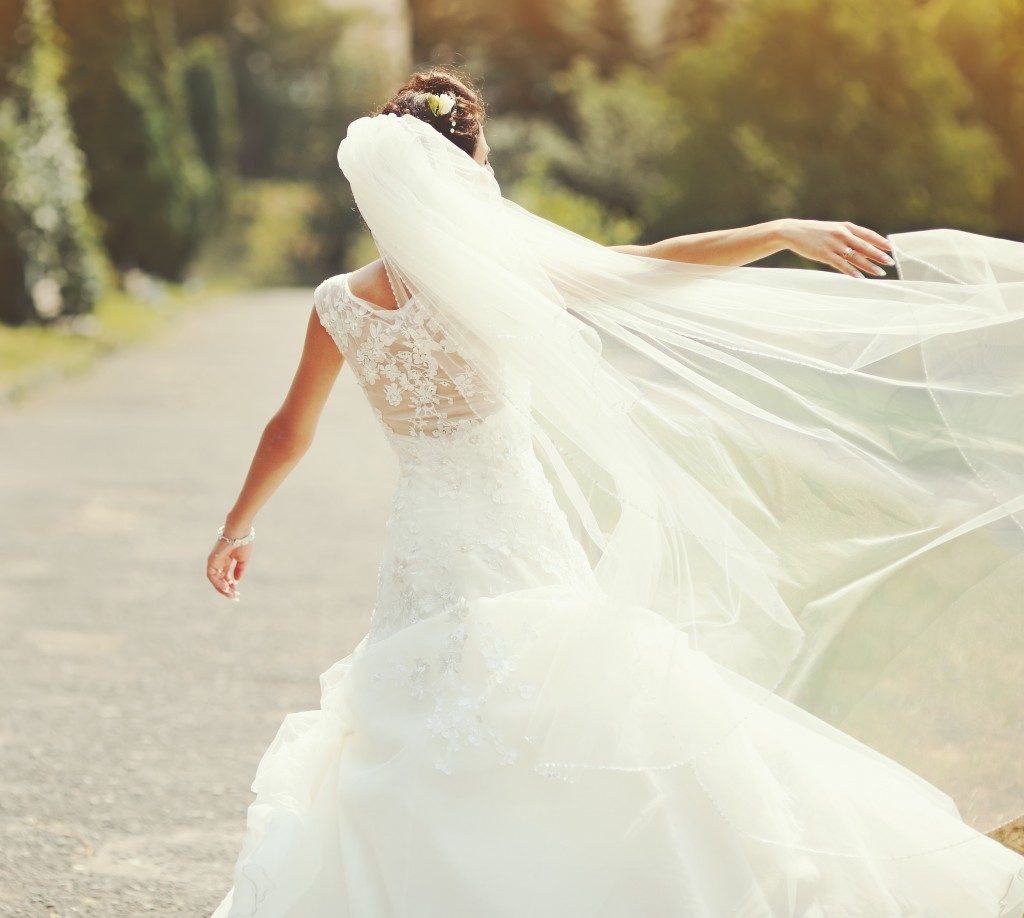 bride spinning around with veil