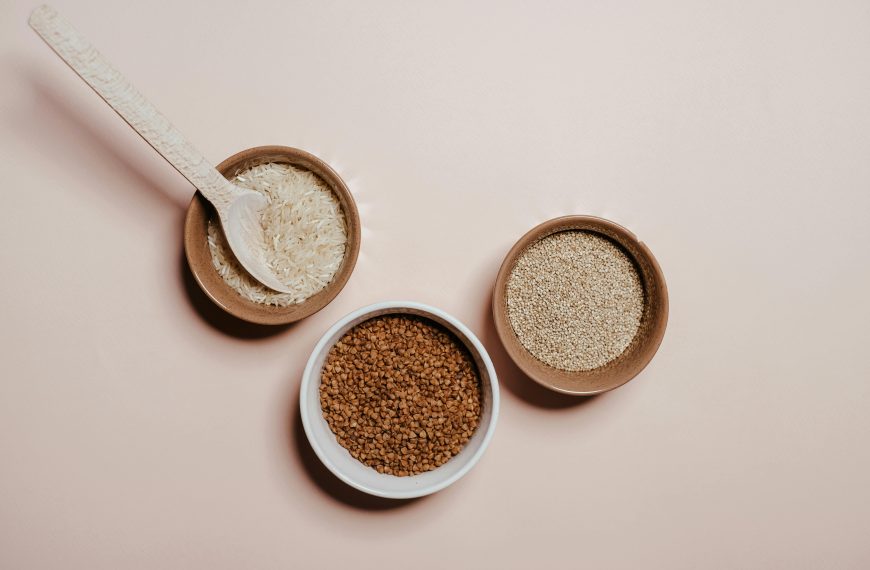 three bowls containing quinoa and rice